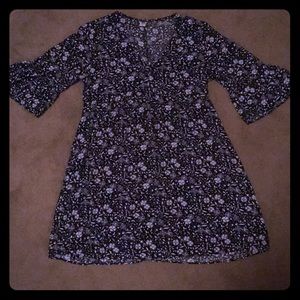 Flowy top can be worn as a dress.